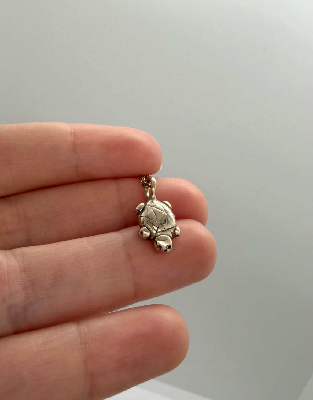 Island turtle charm necklace