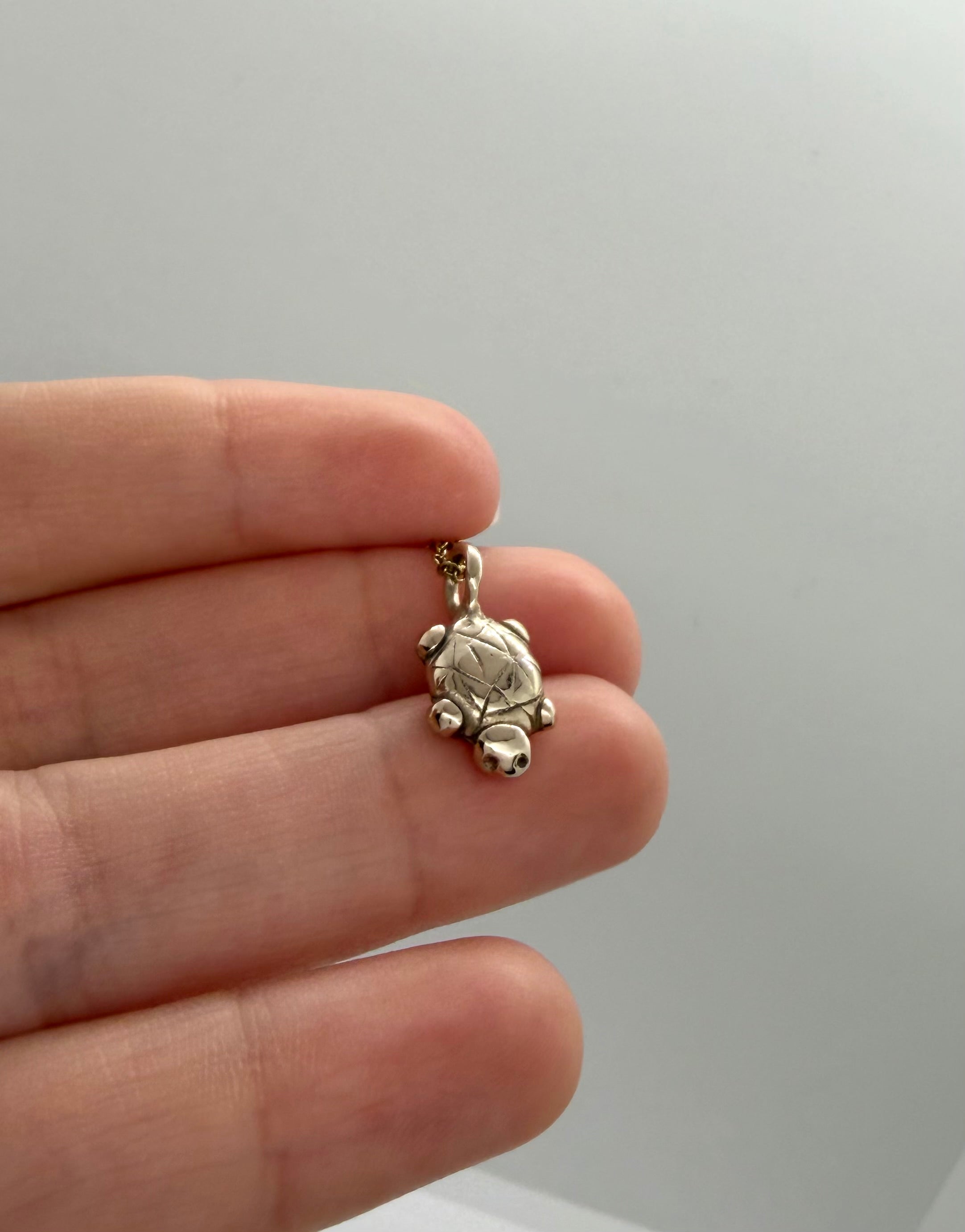 Island turtle charm necklace