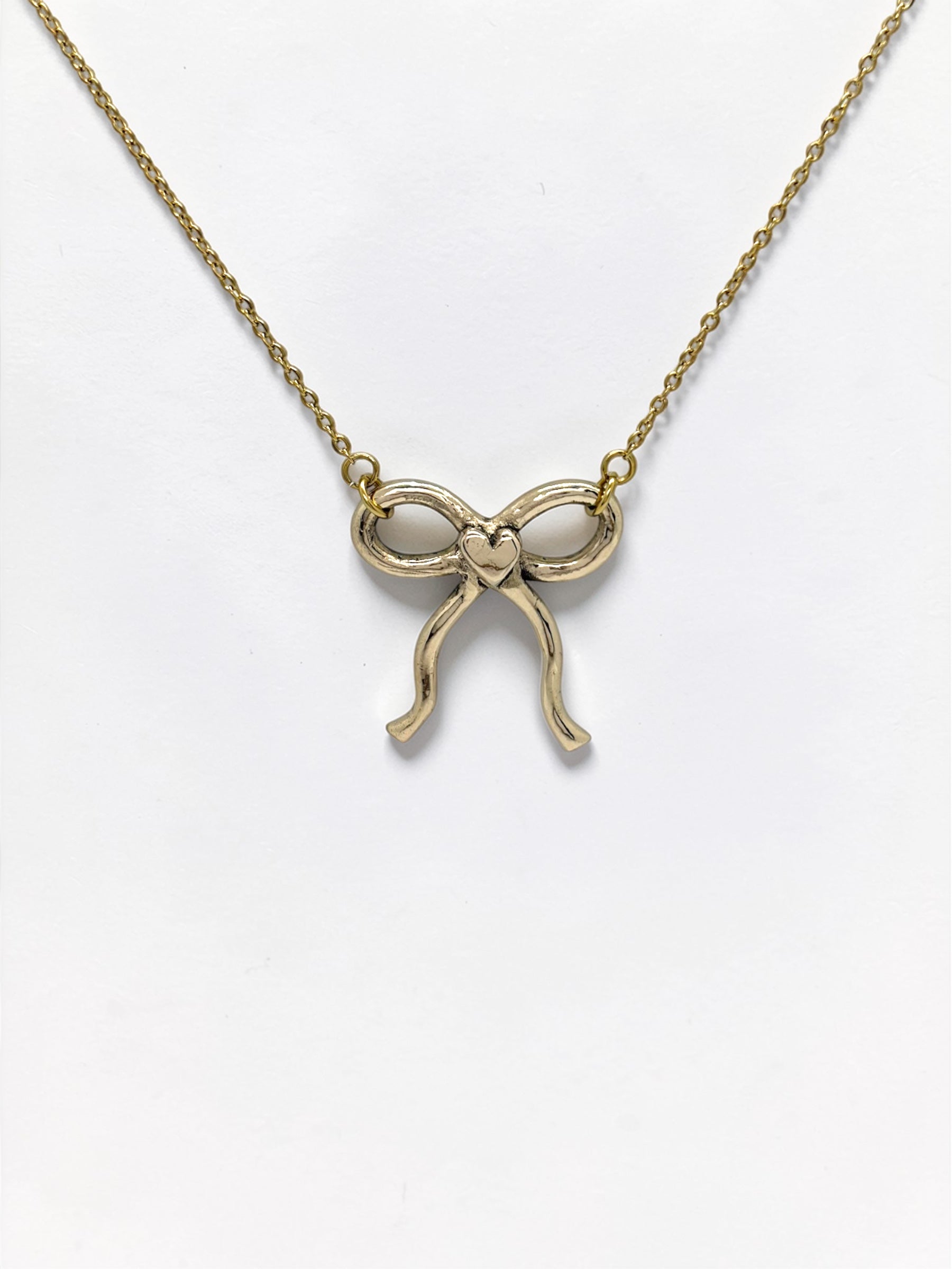 Heart bow charm necklace