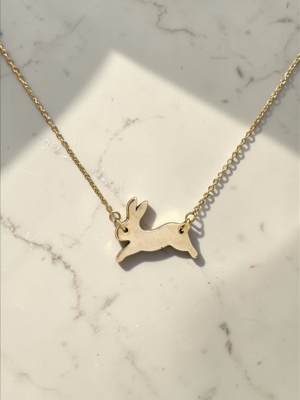 Running bunny charm necklace
