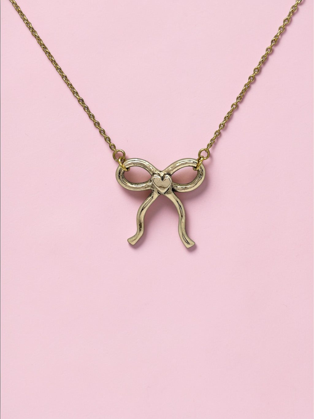 Heart bow charm necklace