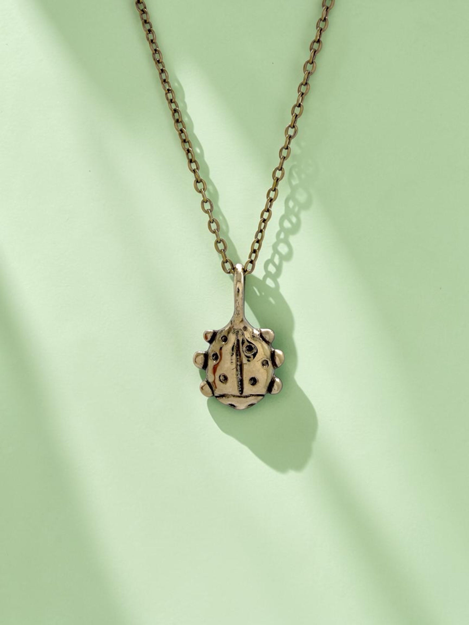 Love bug charm necklace