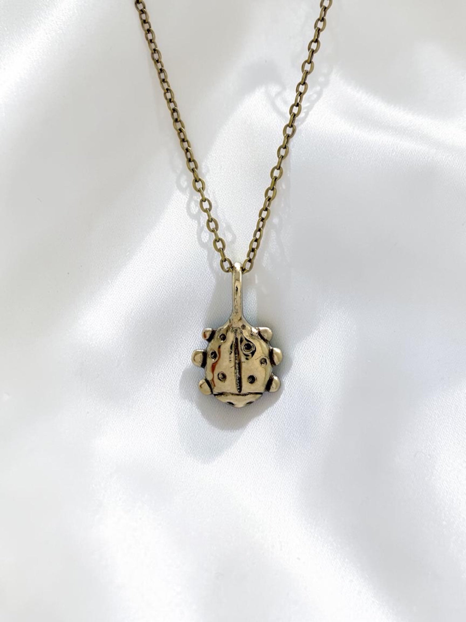 Love bug charm necklace