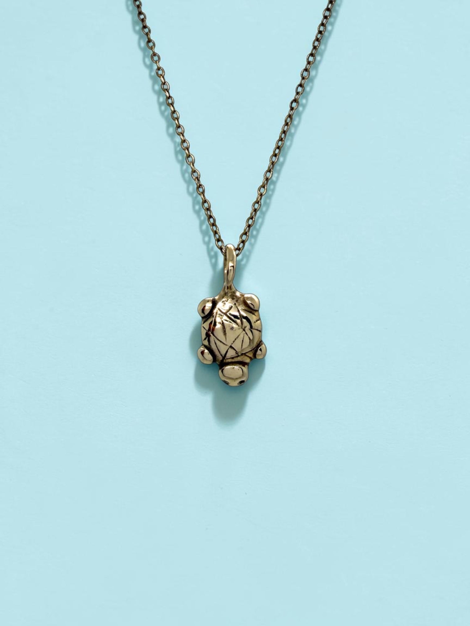 Island turtle charm necklace