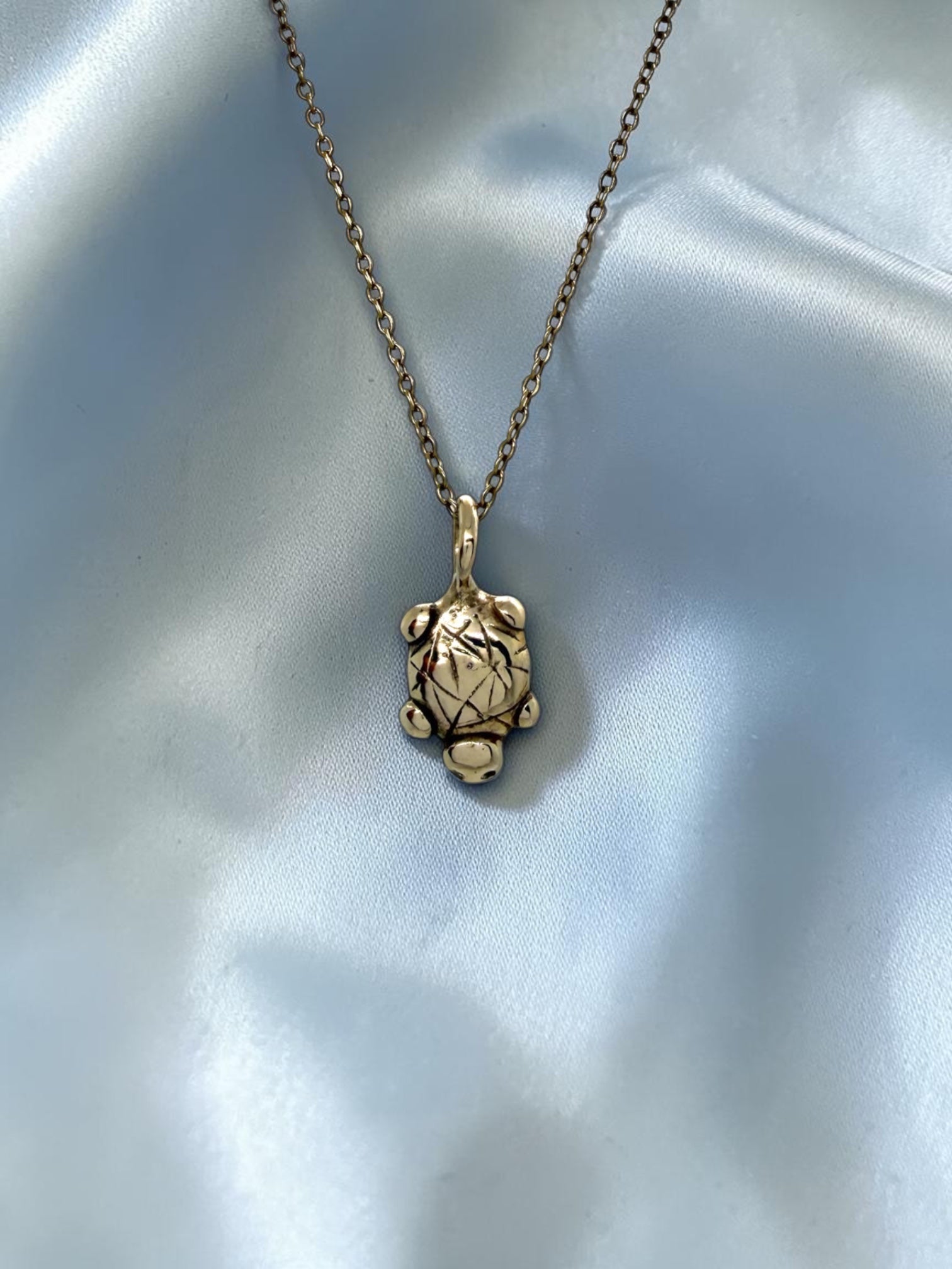 Island turtle charm necklace